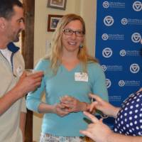 group of attendees talk